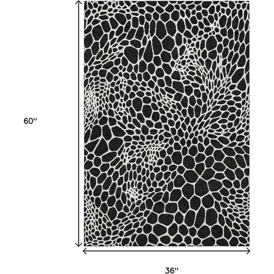 Black And Ivory Geometric Washable Area Rug With UV Protection Photo 3