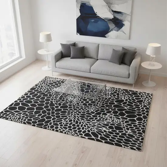 Black And Ivory Geometric Washable Area Rug With UV Protection Photo 2