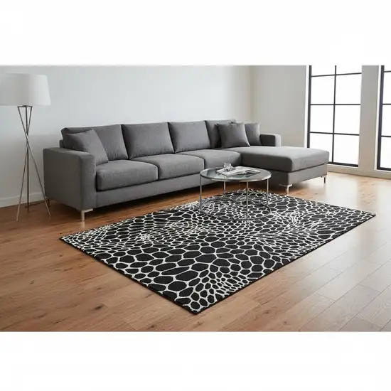 Black And Ivory Geometric Washable Area Rug With UV Protection Photo 2
