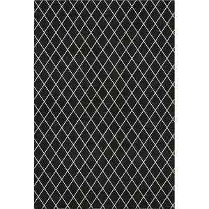 Photo of Black And Ivory Geometric Washable Area Rug With UV Protection