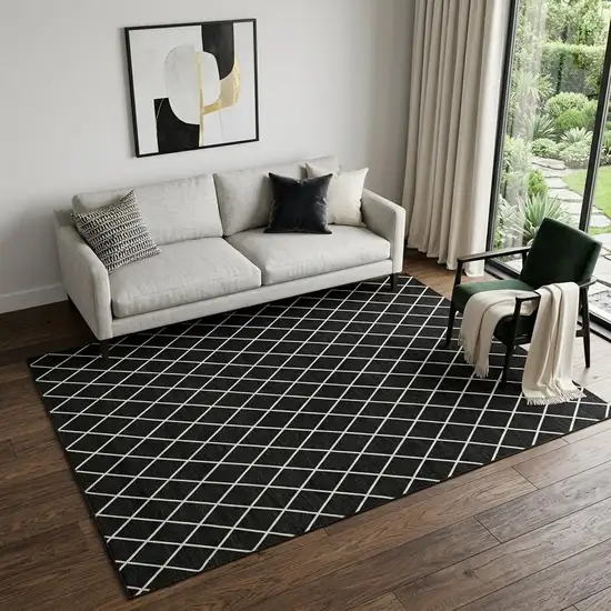 Black And Ivory Geometric Washable Area Rug With UV Protection Photo 1
