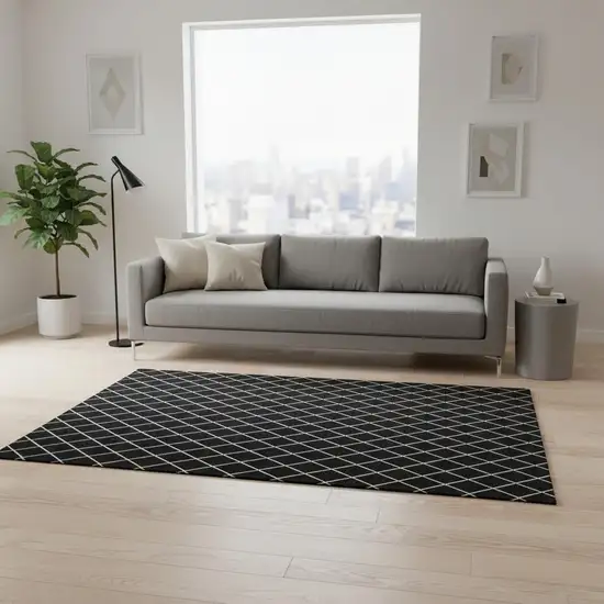 Black And Ivory Geometric Washable Area Rug With UV Protection Photo 2