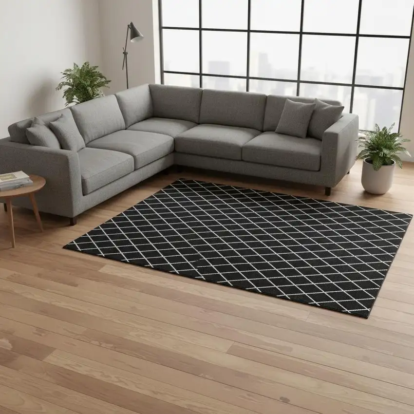 Black And Ivory Geometric Washable Area Rug With UV Protection Photo 2