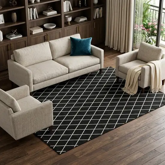 Black And Ivory Geometric Washable Area Rug With UV Protection Photo 1