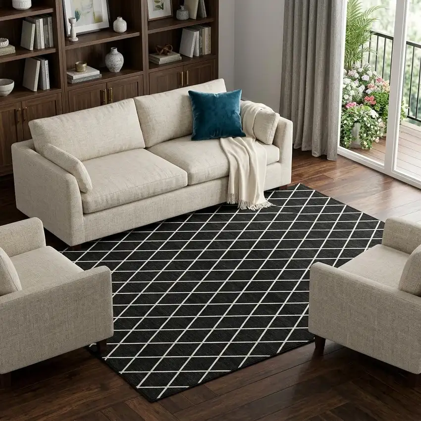 Black And Ivory Geometric Washable Area Rug With UV Protection Photo 1