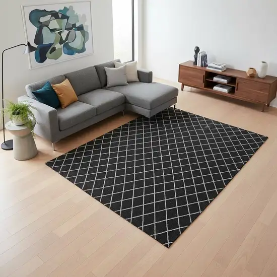 Black And Ivory Geometric Washable Area Rug With UV Protection Photo 2