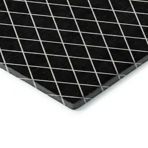 Photo of Black And Ivory Geometric Washable Area Rug With UV Protection