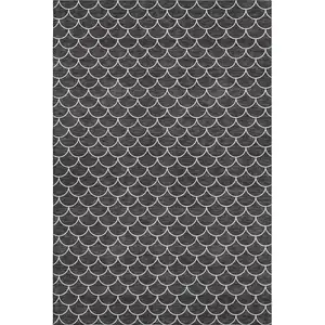 Photo of Black And Ivory Geometric Washable Area Rug With UV Protection