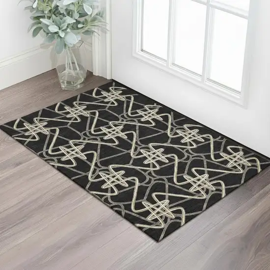 Black And Ivory Geometric Washable Area Rug With UV Protection Photo 2