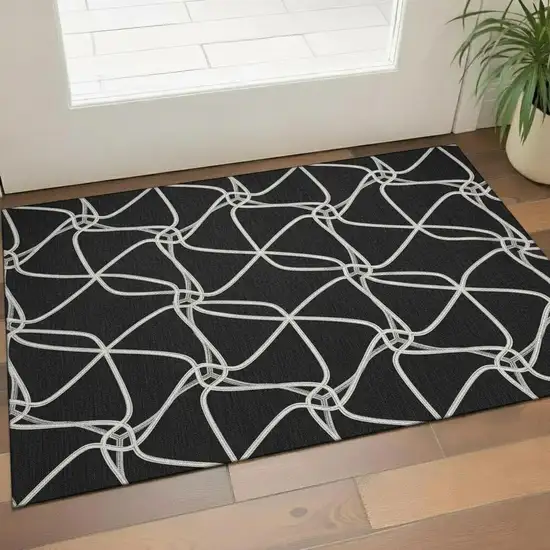Black And Ivory Geometric Washable Area Rug With UV Protection Photo 2