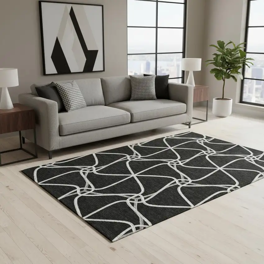 Black And Ivory Geometric Washable Area Rug With UV Protection Photo 2