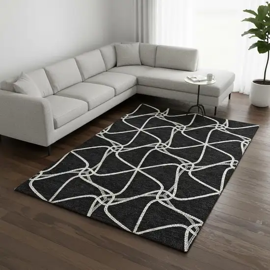 Black And Ivory Geometric Washable Area Rug With UV Protection Photo 2