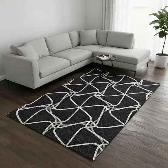 Black And Ivory Geometric Washable Area Rug With UV Protection Photo 2