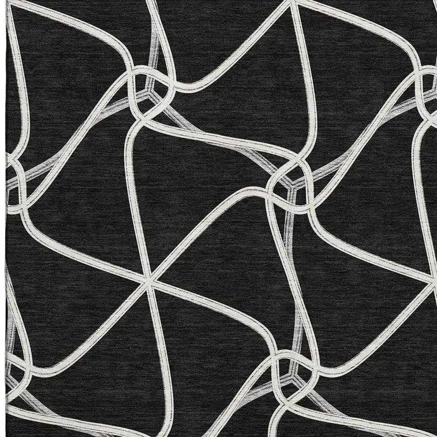Black And Ivory Geometric Washable Area Rug With UV Protection Photo 2