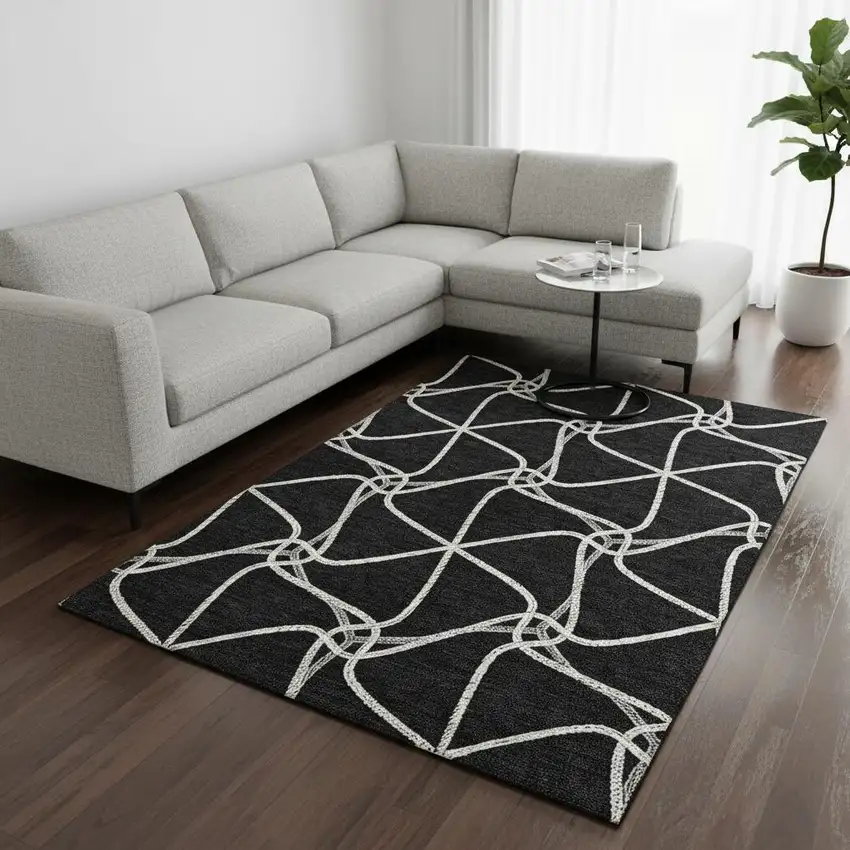 Black And Ivory Geometric Washable Area Rug With UV Protection Photo 2