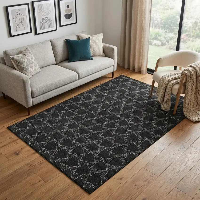Black And Ivory Geometric Washable Area Rug With UV Protection Photo 1