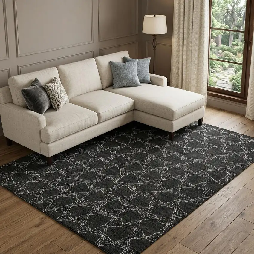 Black And Ivory Geometric Washable Area Rug With UV Protection Photo 1