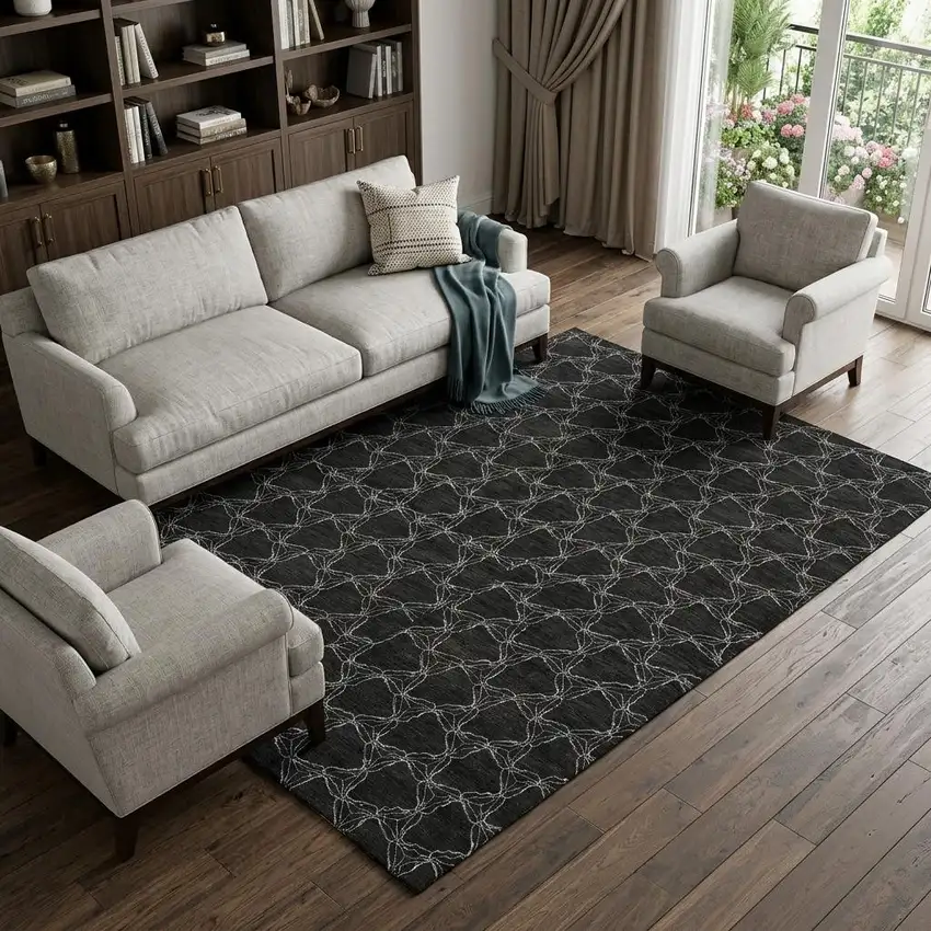 Black And Ivory Geometric Washable Area Rug With UV Protection Photo 1