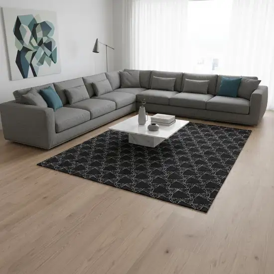 Black And Ivory Geometric Washable Area Rug With UV Protection Photo 2