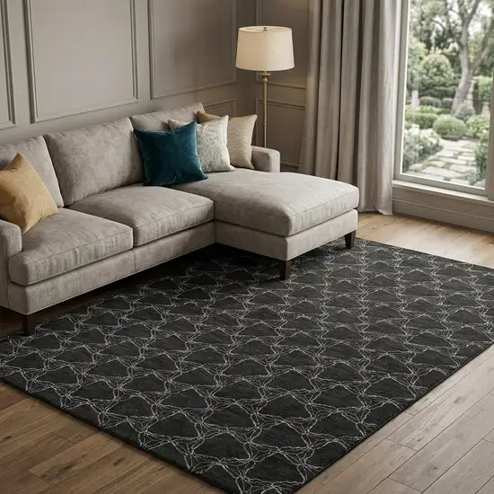 Black And Ivory Geometric Washable Area Rug With UV Protection Photo 1