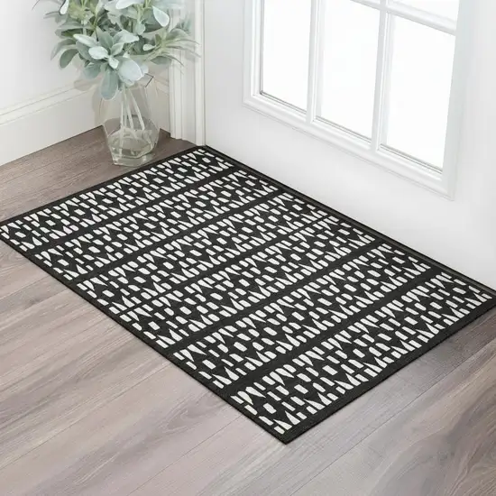 Black And Ivory Geometric Washable Area Rug With UV Protection Photo 2