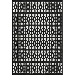 Photo of Black And Ivory Geometric Washable Area Rug With UV Protection