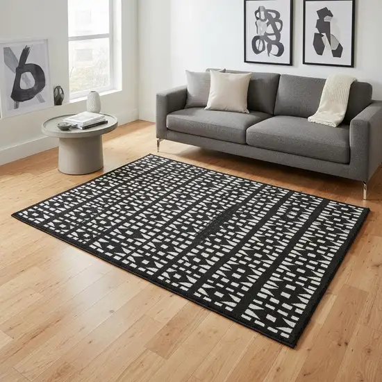 Black And Ivory Geometric Washable Area Rug With UV Protection Photo 2