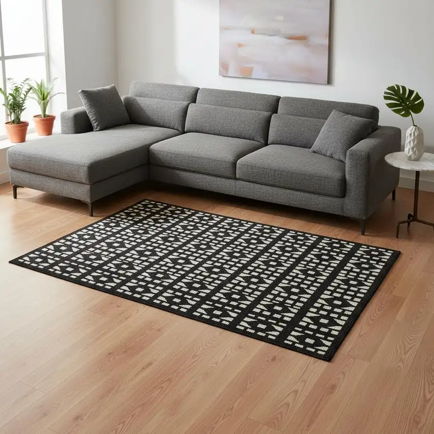 Black And Ivory Geometric Washable Area Rug With UV Protection Photo 2