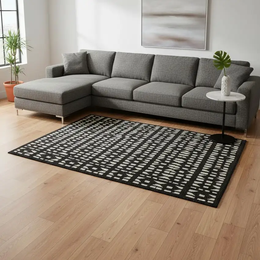 Black And Ivory Geometric Washable Area Rug With UV Protection Photo 2