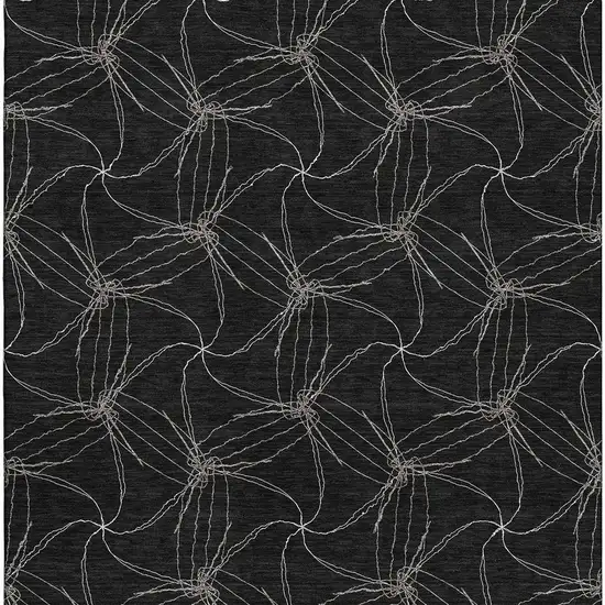 Black And Ivory Geometric Washable Area Rug With UV Protection Photo 3