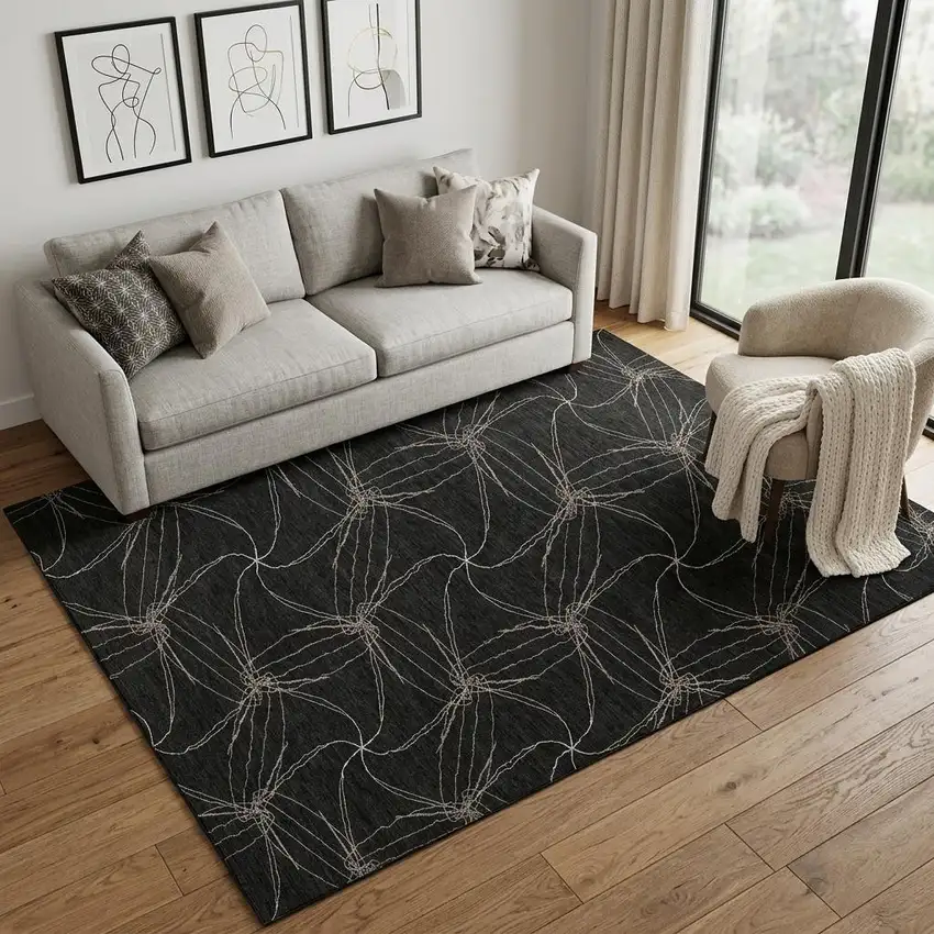 Black And Ivory Geometric Washable Area Rug With UV Protection Photo 1