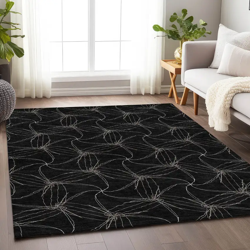 Black And Ivory Geometric Washable Area Rug With UV Protection Photo 4