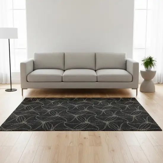 Black And Ivory Geometric Washable Area Rug With UV Protection Photo 2