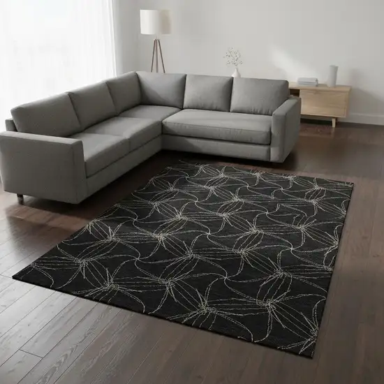 Black And Ivory Geometric Washable Area Rug With UV Protection Photo 2