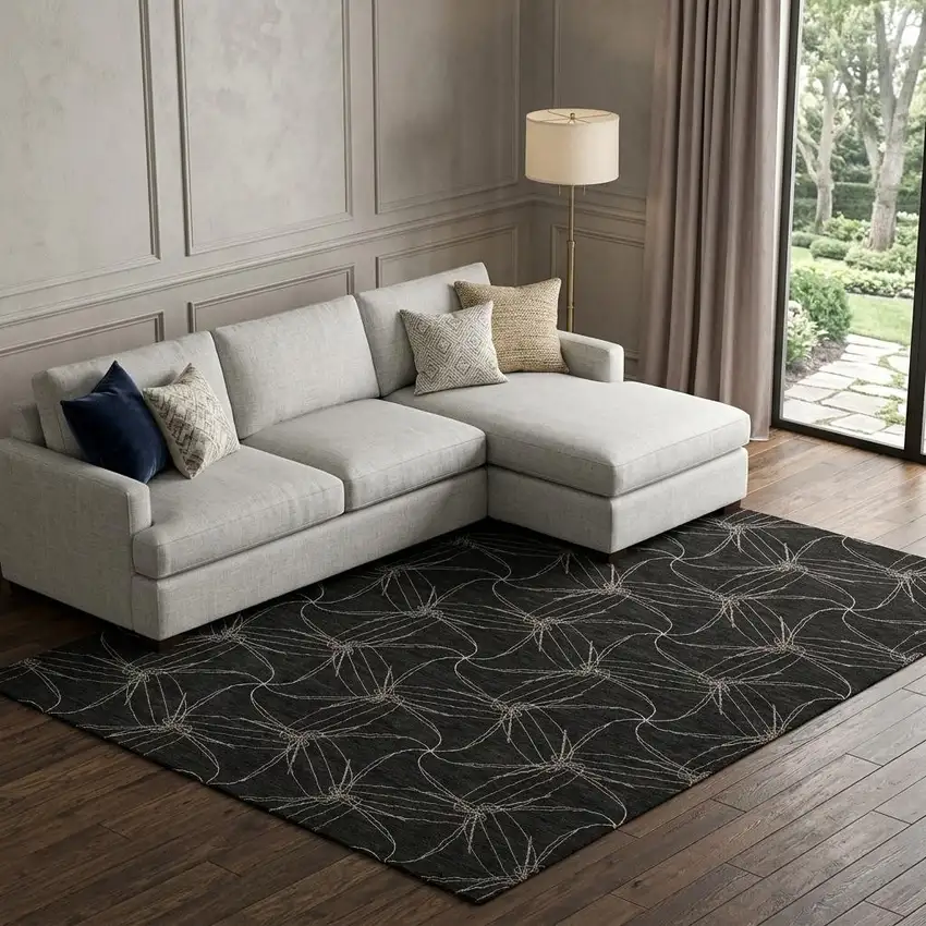 Black And Ivory Geometric Washable Area Rug With UV Protection Photo 1