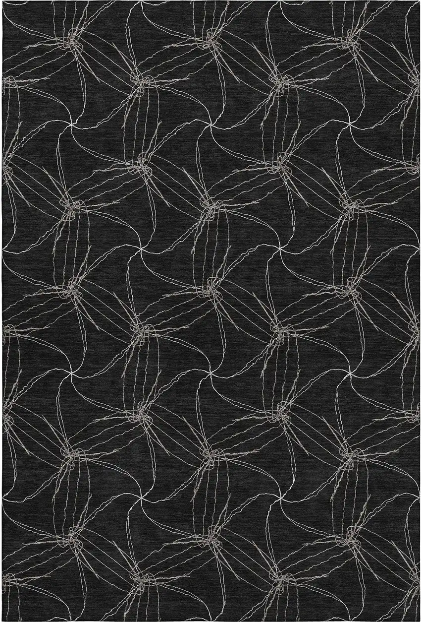 Black And Ivory Geometric Washable Area Rug With UV Protection Photo 1