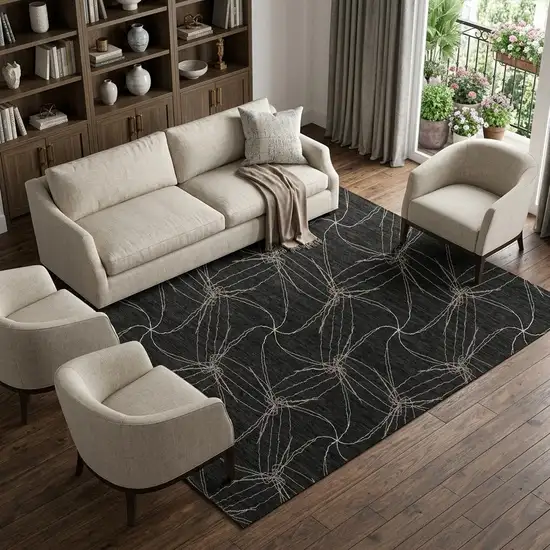 Black And Ivory Geometric Washable Area Rug With UV Protection Photo 1
