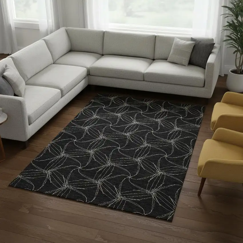Black And Ivory Geometric Washable Area Rug With UV Protection Photo 2