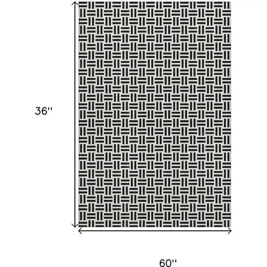 Black And Ivory Geometric Washable Area Rug With UV Protection Photo 7