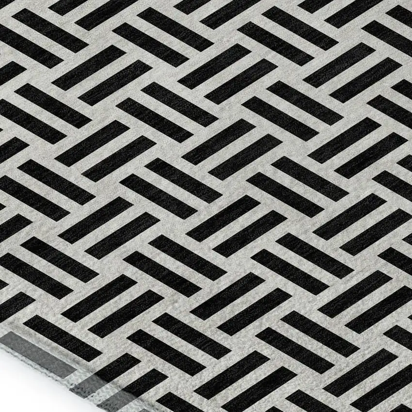 Black And Ivory Geometric Washable Area Rug With UV Protection Photo 2