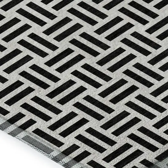 Black And Ivory Geometric Washable Area Rug With UV Protection Photo 2