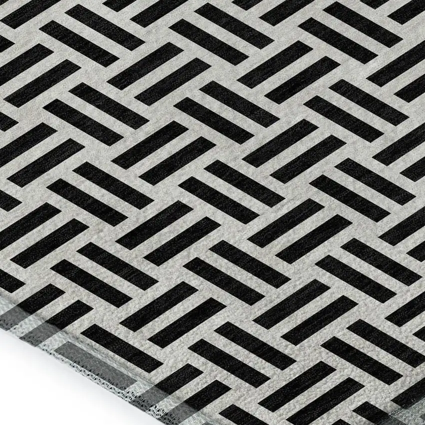 Black And Ivory Geometric Washable Area Rug With UV Protection Photo 2