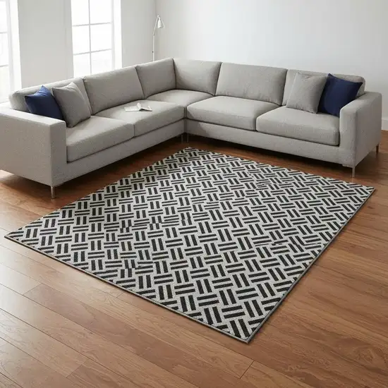 Black And Ivory Geometric Washable Area Rug With UV Protection Photo 2