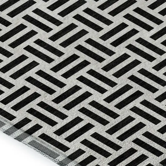 Black And Ivory Geometric Washable Area Rug With UV Protection Photo 2