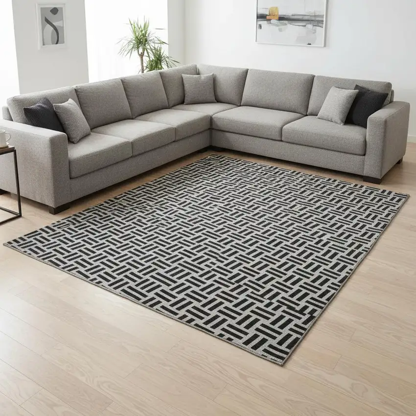 Black And Ivory Geometric Washable Area Rug With UV Protection Photo 2