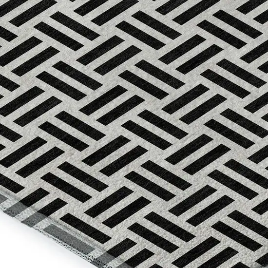 Black And Ivory Geometric Washable Area Rug With UV Protection Photo 2