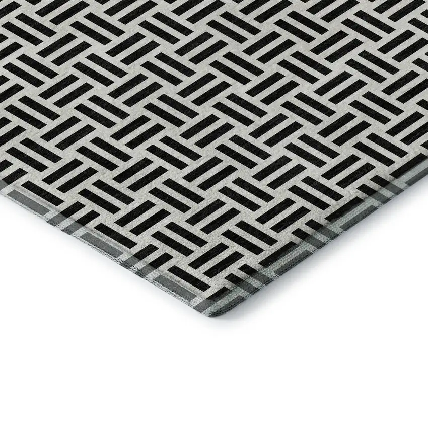 Black And Ivory Geometric Washable Area Rug With UV Protection Photo 1