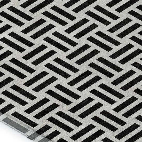 Black And Ivory Geometric Washable Area Rug With UV Protection Photo 2