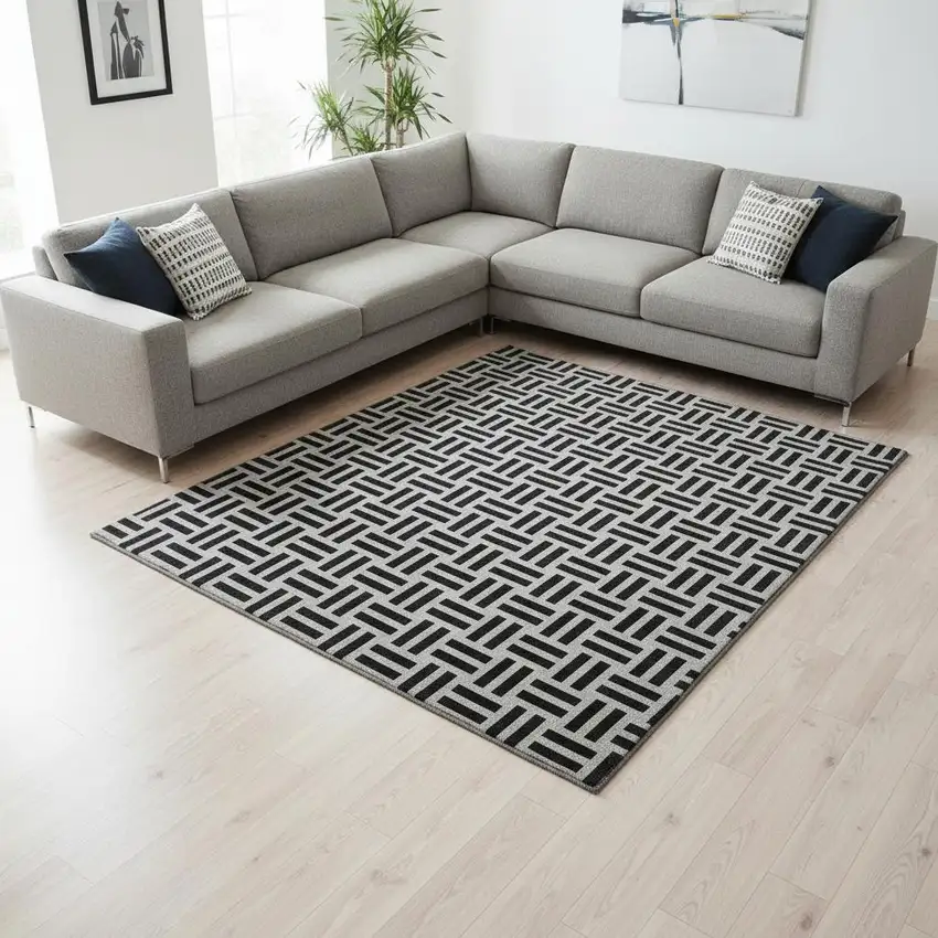 Black And Ivory Geometric Washable Area Rug With UV Protection Photo 2