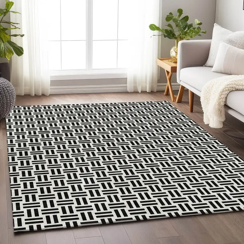 Black And Ivory Geometric Washable Area Rug With UV Protection Photo 4